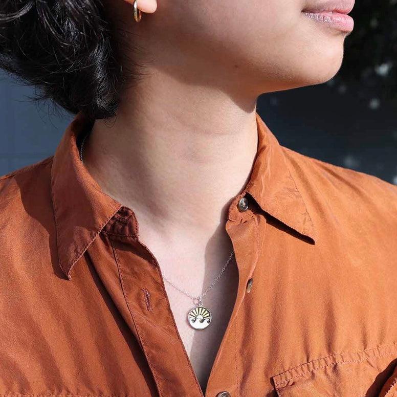 Sterling Silver Wave Necklace with Bronze Sun